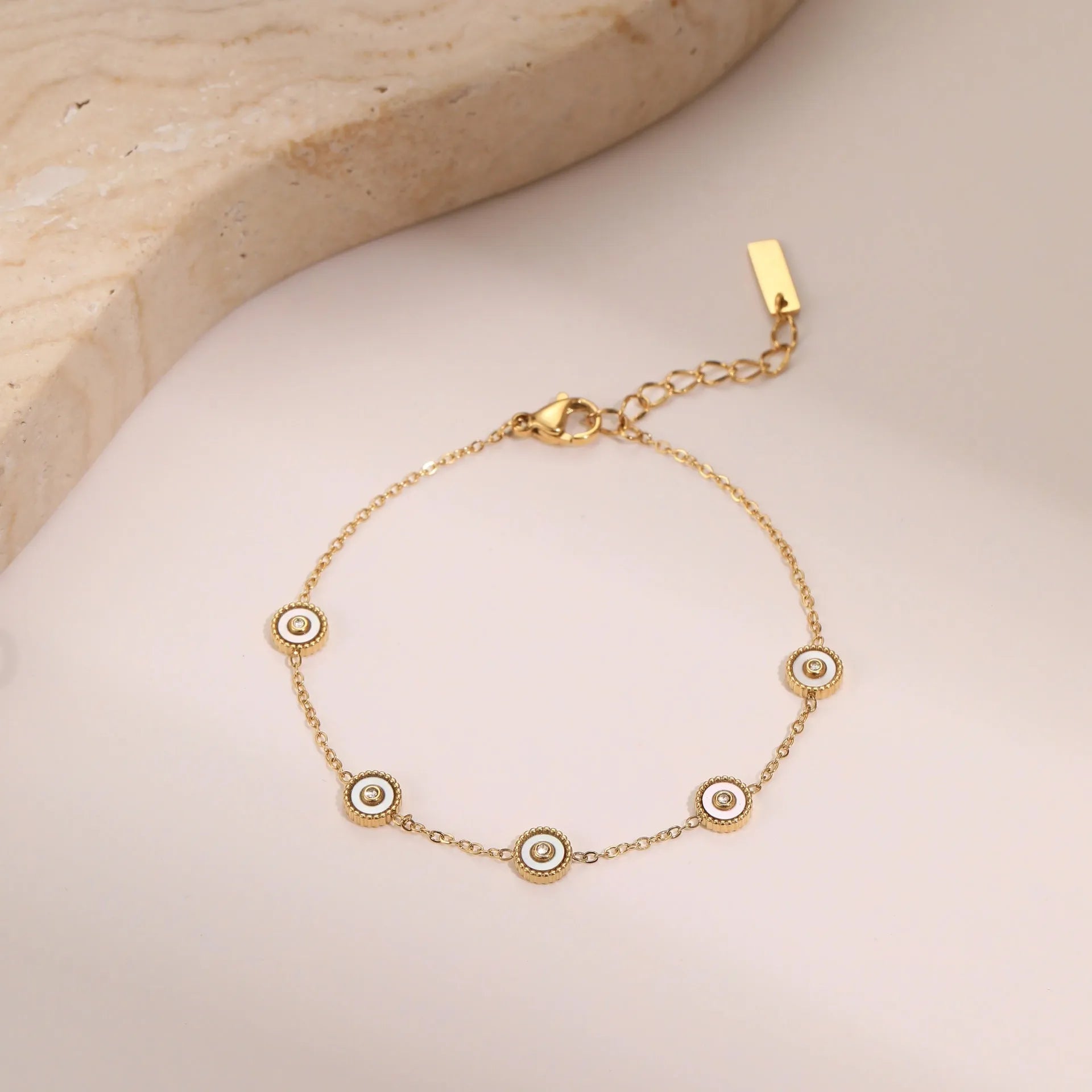 Women's stainless steel bracelet with 18K gold plating and geometric design