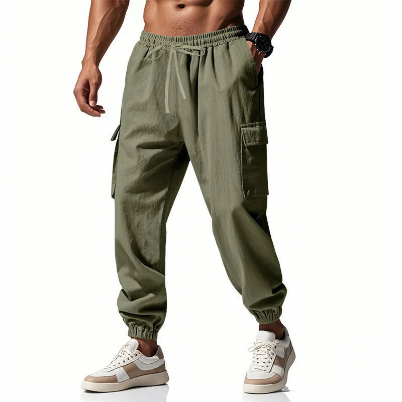 Men's linen casual trousers with ankle-tied design and multiple pockets in army green colour.