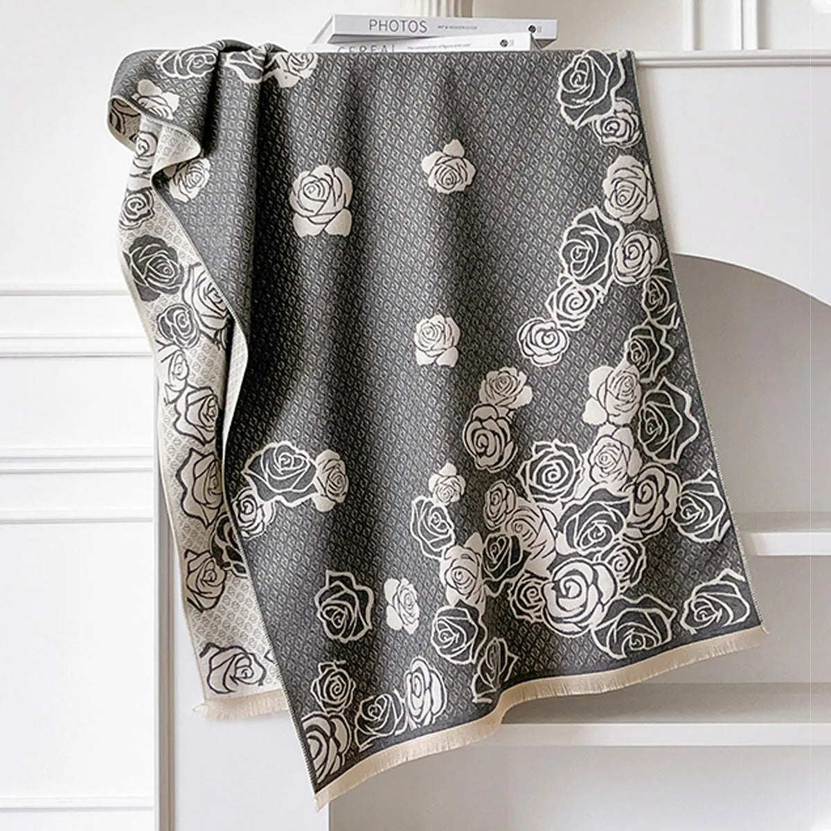 Long grey imitation cashmere winter scarf with tassels, shown draped