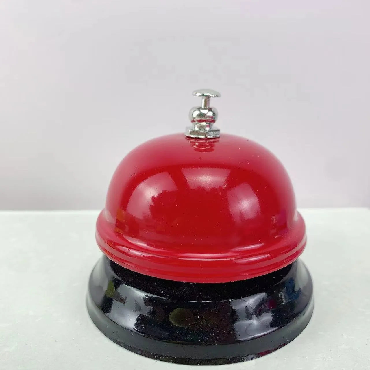 Iron class game bell in one of eleven colour options including red, green, blue, pink and yellow.