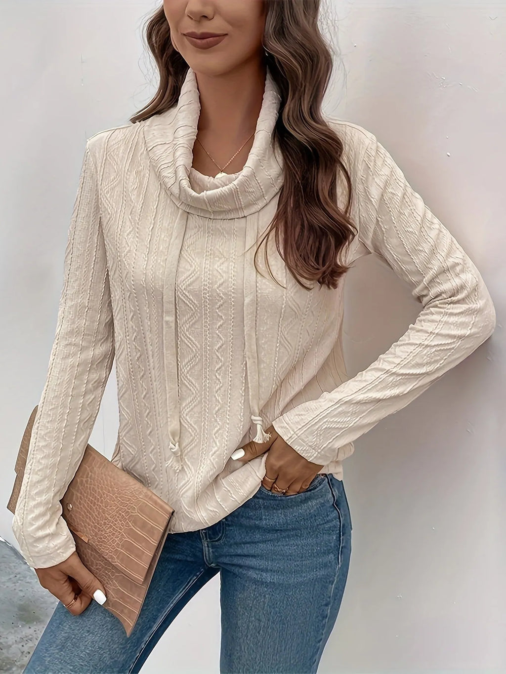 Apricot coloured hooded pullover sweater with drawstring and long sleeves