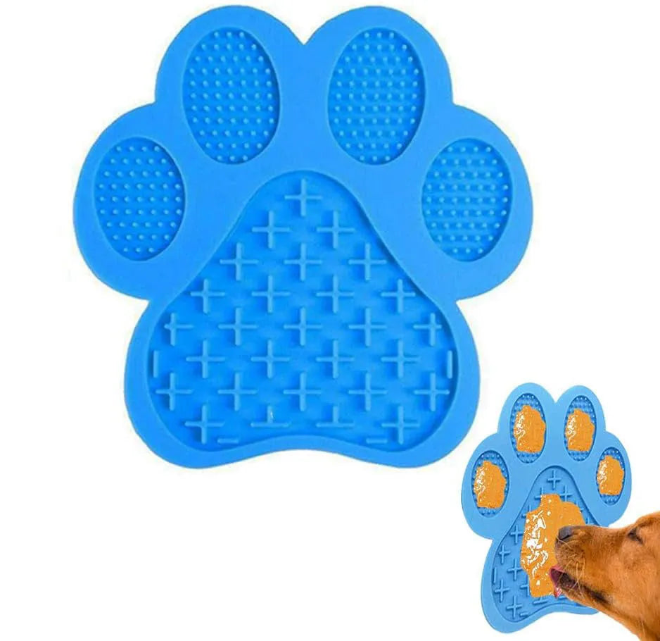 Blue bone-textured silicone dog licking mat with suction cups on a white tile background.