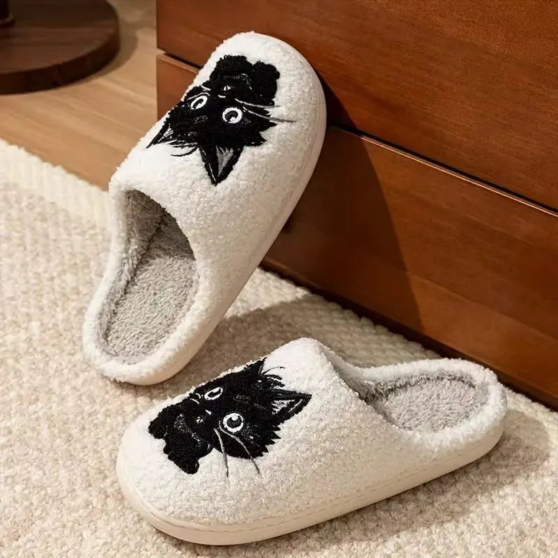 White plush cotton couple slippers with black cat cartoon design and non-slip TPR soles