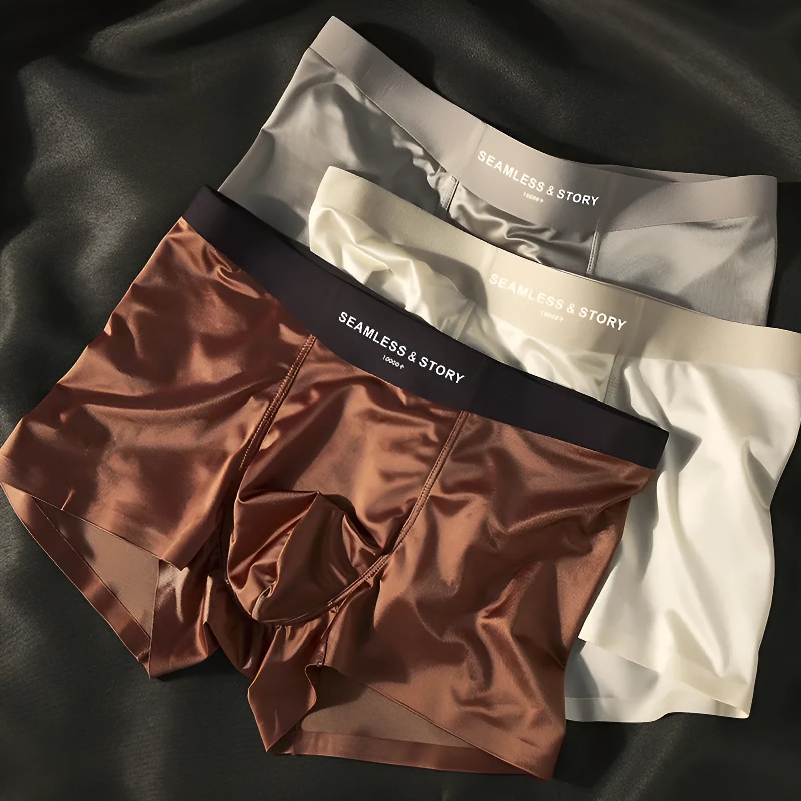 Men's solid colour ice silk nylon underwear in mid waist design on a neutral background.