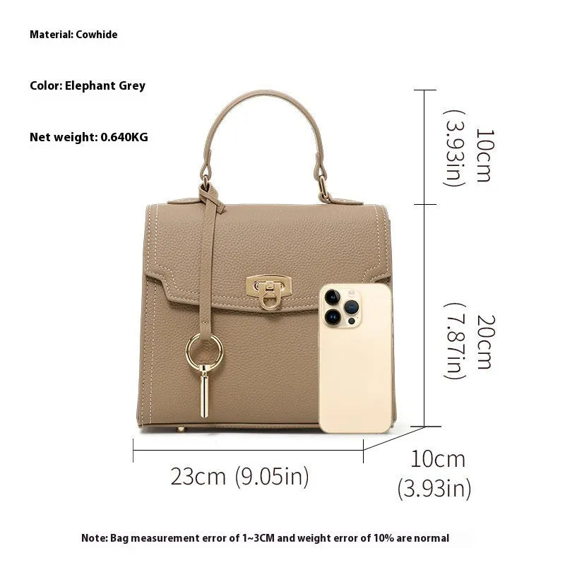 Elephant grey genuine leather handbag with litchi pattern texture and vintage lock closure