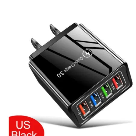 Dark blue 4-port USB wall charger with EU plug next to mobile phone