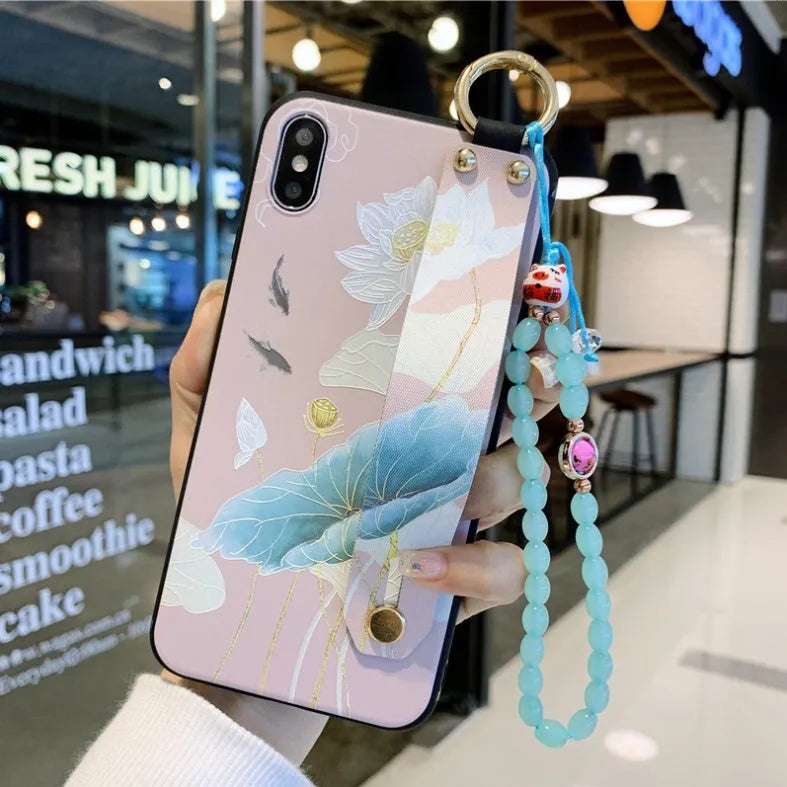 Rose flower patterned iPhone case with wrist strap attachment for iPhone models