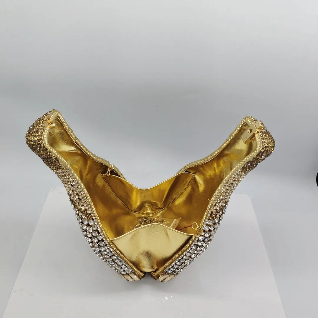 Gold champagne bottle-shaped rhinestone evening clutch bag with hard alloy construction.