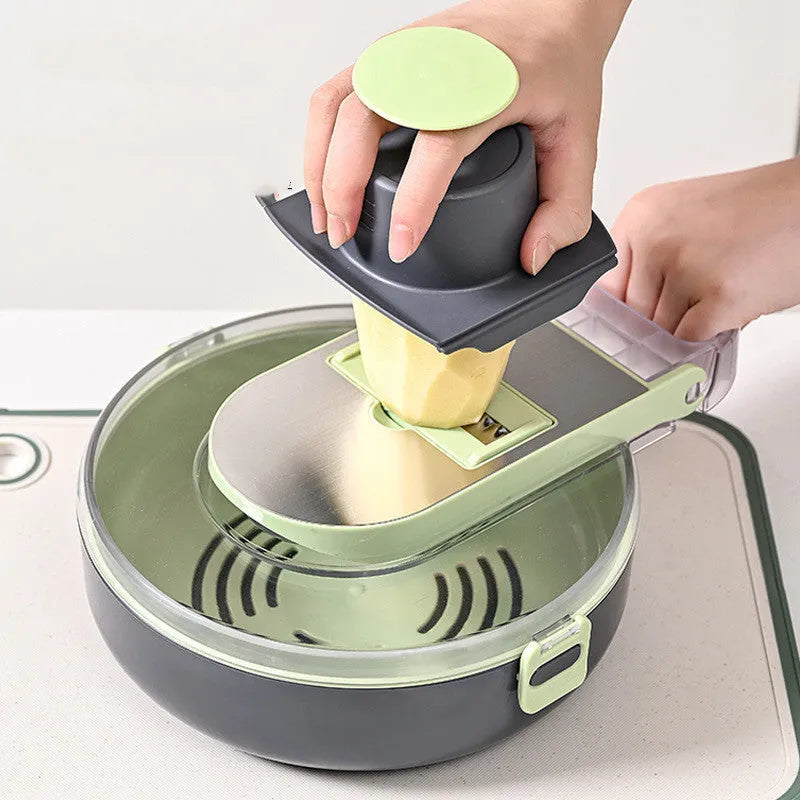 Grey and white multifunctional vegetable cutter set with stainless steel blades, eight knives, and storage accessories
