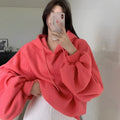 Watermelon red women's sleeveless hooded pullover sweater made from mulberry silk fabric.
