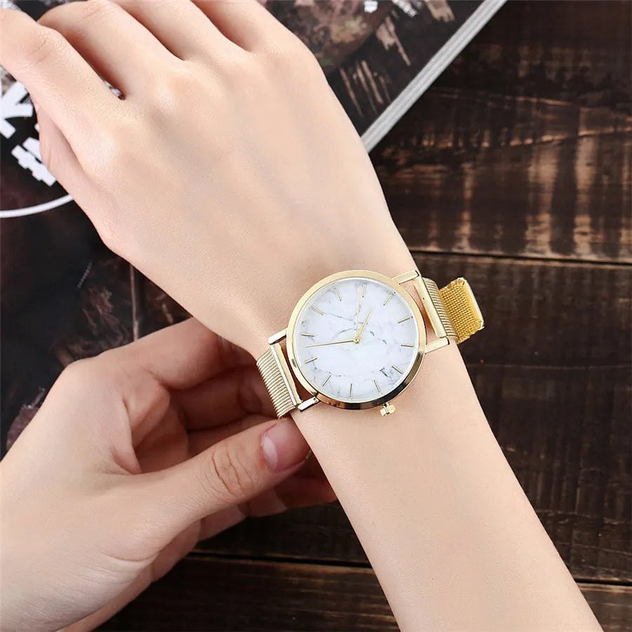Vansvar women's quartz watch with silver mesh band and marble dial