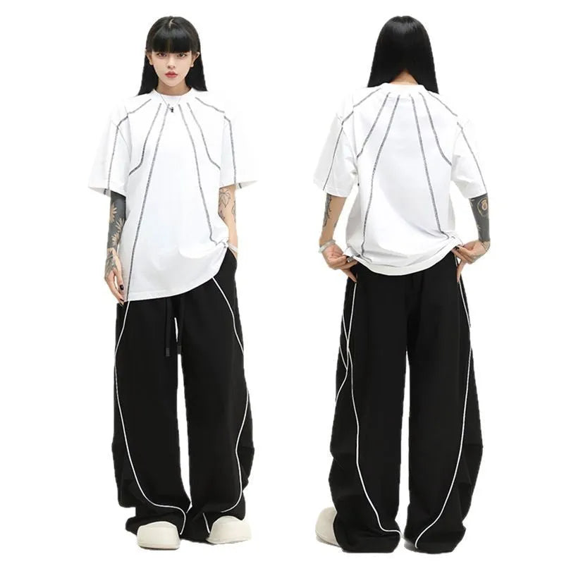 Black pleated wide-leg hip hop trousers with striped pattern and mid-waist design