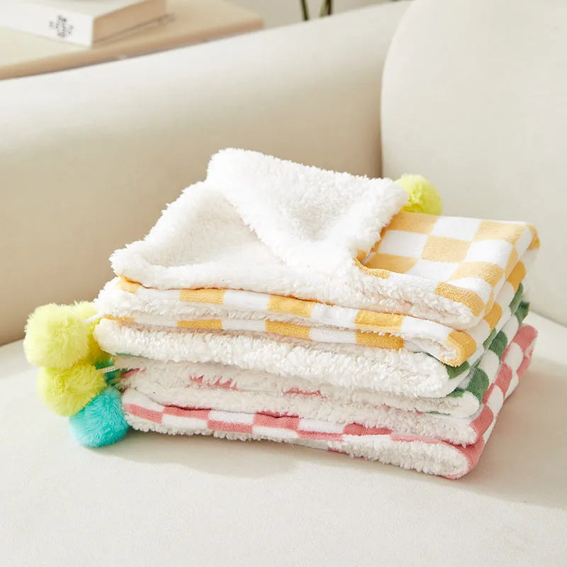 Plaid pattern pet blanket with fur ball decorations in green, pink or yellow colours