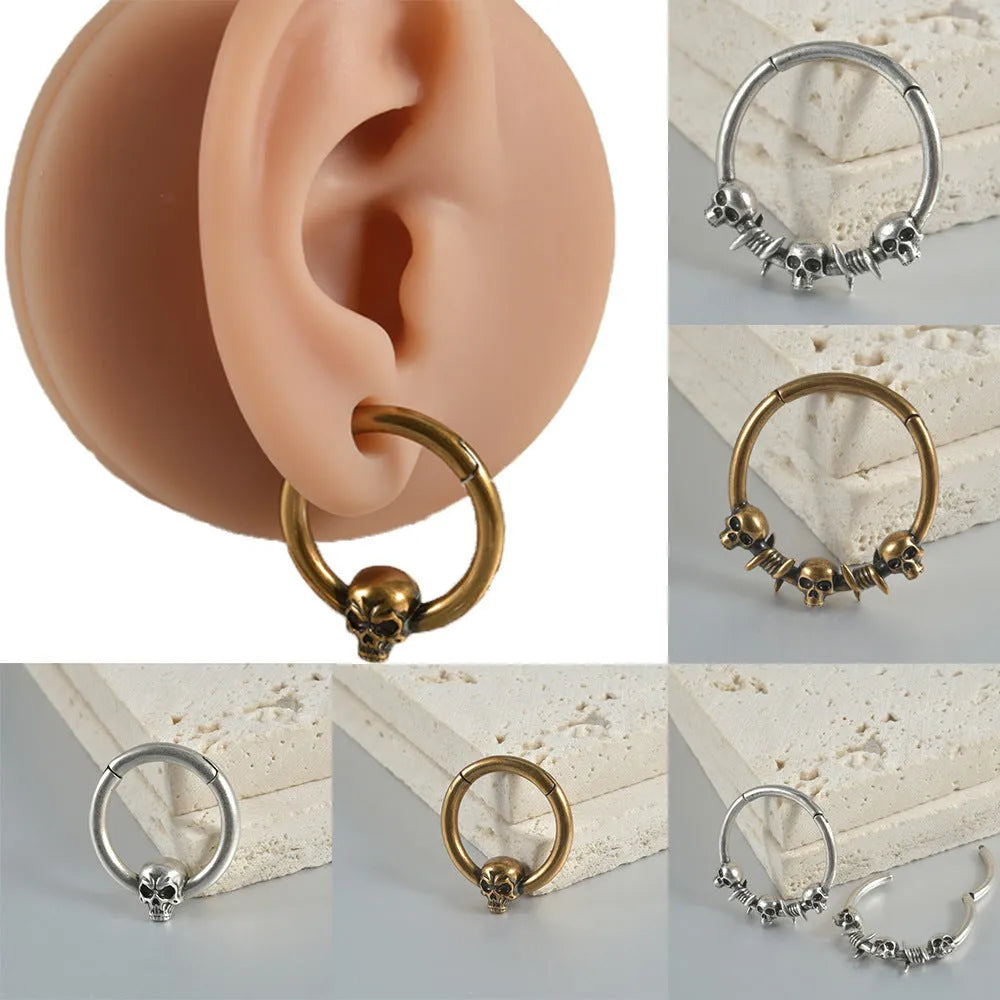 Copper punk earrings with vintage ghost head design in antique gold and silver finishes