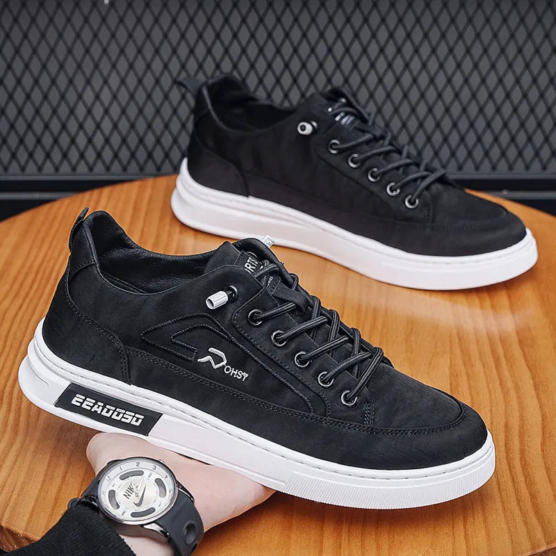 Men's grey canvas casual sneakers with leather lining and round toe design