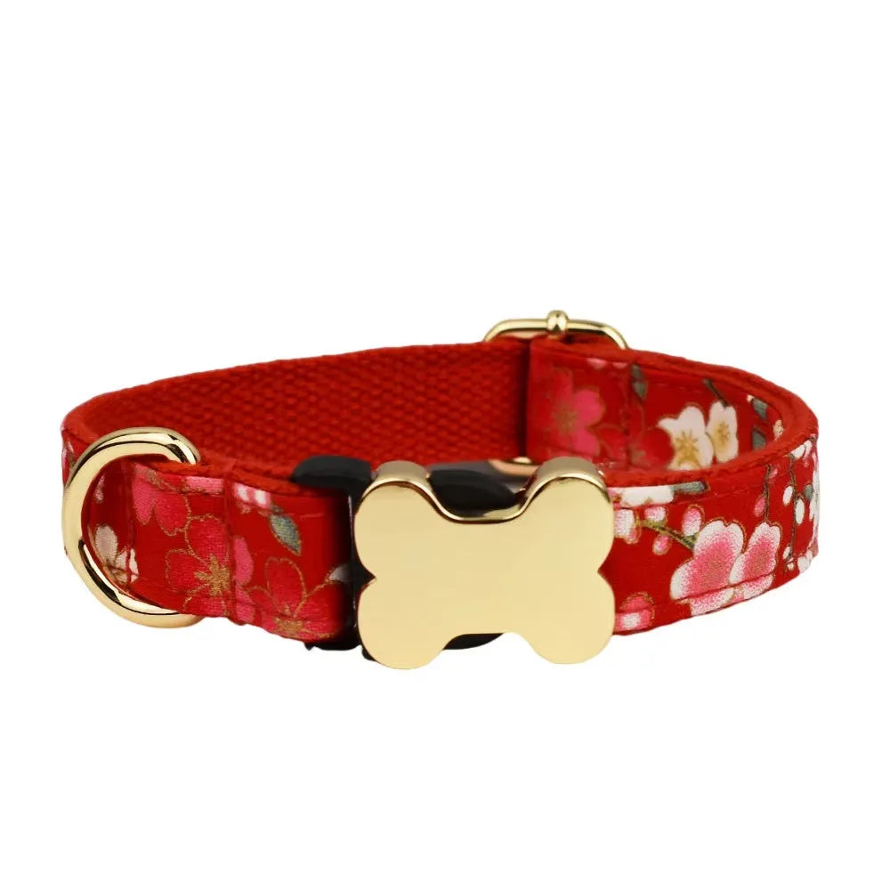 Flat nylon dog collar with a printed grid pattern and a silver bone-shaped metal buckle on a white background.