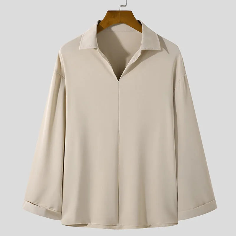 Men's loose lapel casual long sleeve shirt in solid colours on a hanger