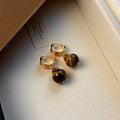 Geometric tigereye earrings with gold plating in black and brown colour options