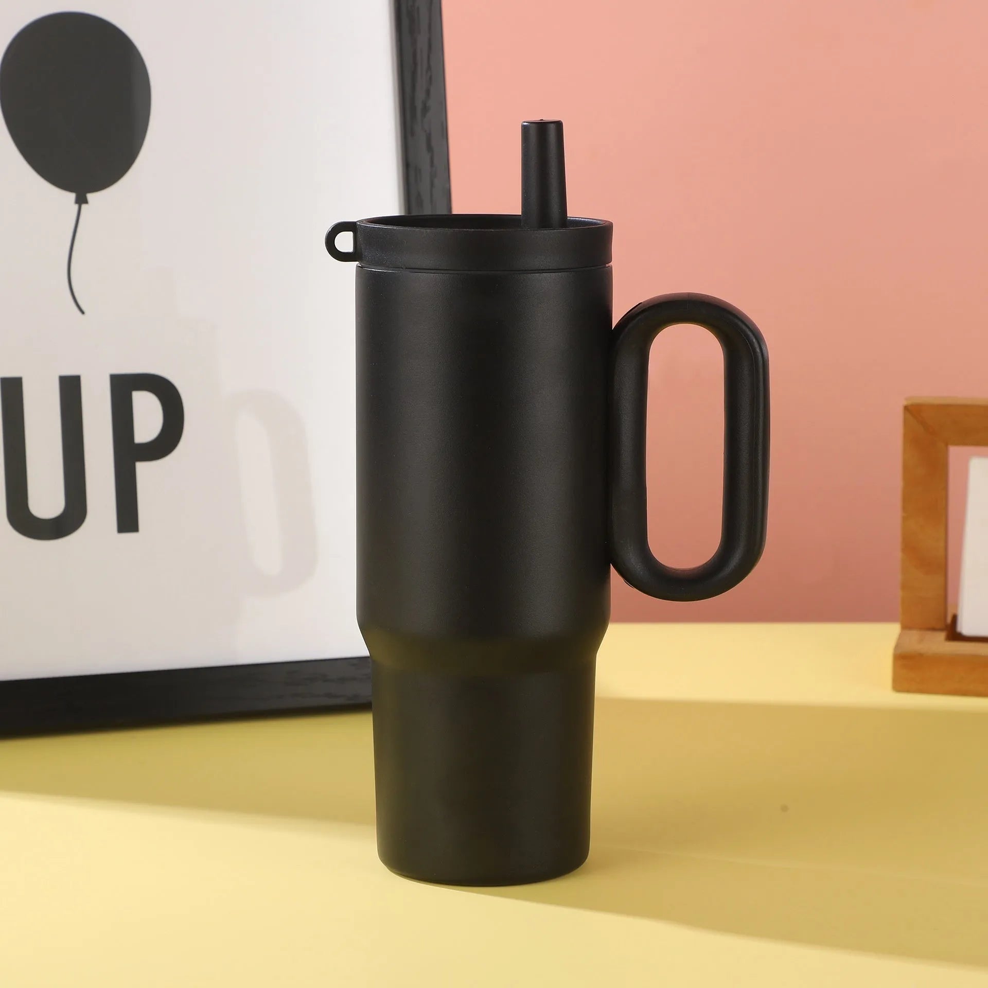 DIY Vitality large insulated straw cup with handle in black, pink, blue, white, or yellow.