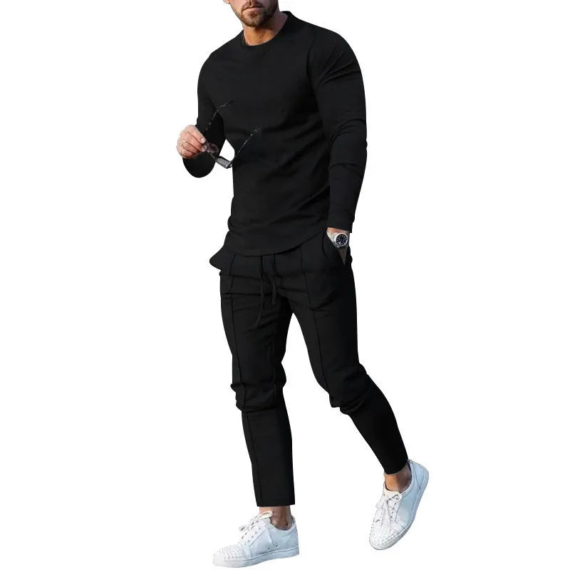 Men's solid colour two-piece polyester tracksuit with long sleeves, shown in apricot colour.