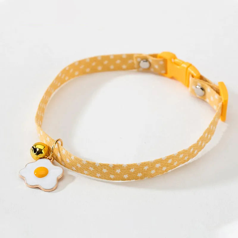 Adjustable cat collar with bell pendant and decorative bow tie in green, pink or yellow colours