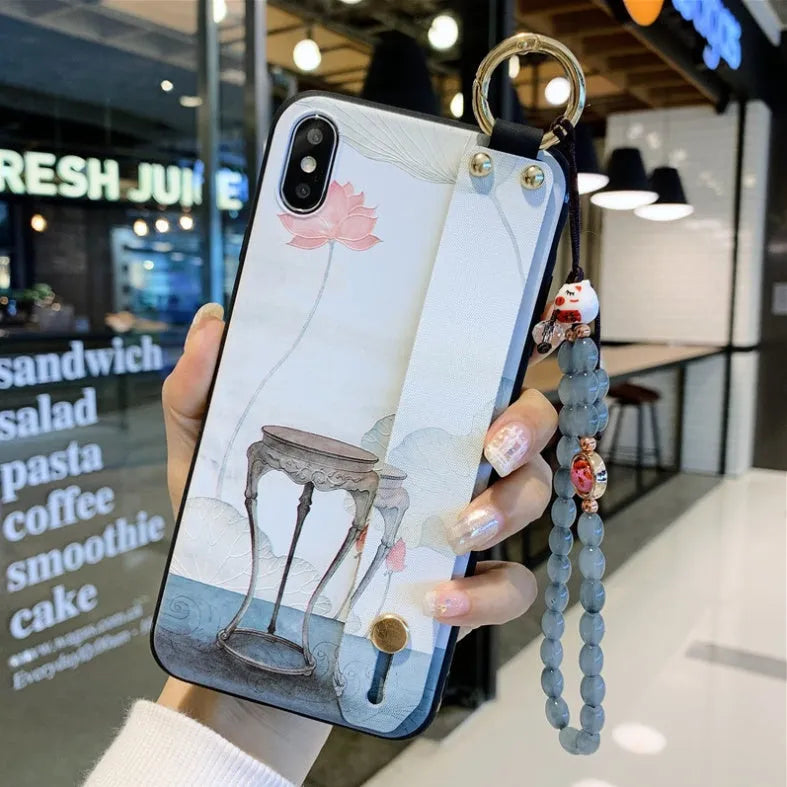 Rose flower patterned iPhone case with wrist strap attachment for iPhone models