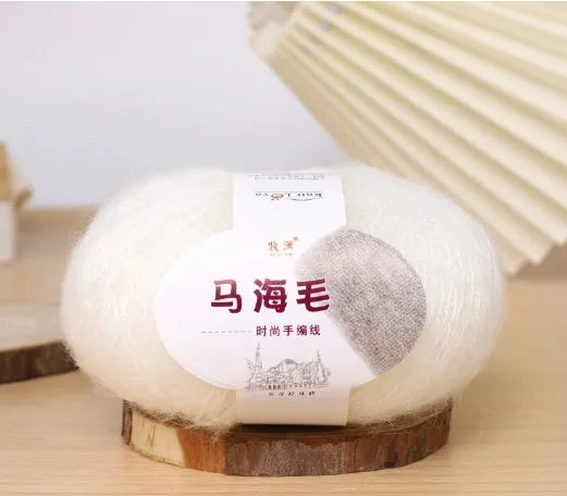 Mohair wool ball for DIY scarf knitting in assorted colours on white background