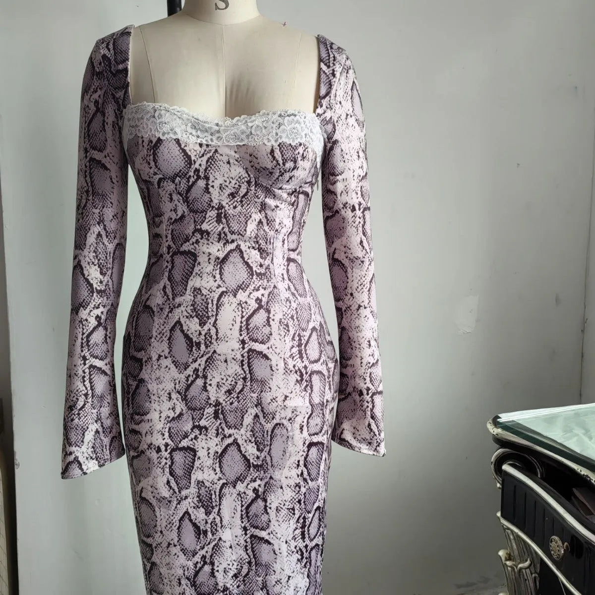 Grey slim fit lace dress with long sleeves, A-line skirt, and 3D digital print pattern.