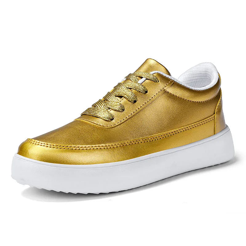 Women's white leather casual flat lace-up shoes on a neutral background.
