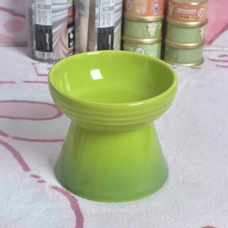 Black ceramic pet bowl with high foot and raised neck for dog or cat feeding