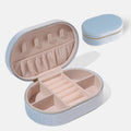 Oval velvet jewellery storage box in lake blue colour with flannel lining, shown with internal hook