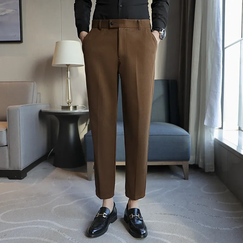Men's straight fit brown corduroy trousers with elastic waistband on hanger
