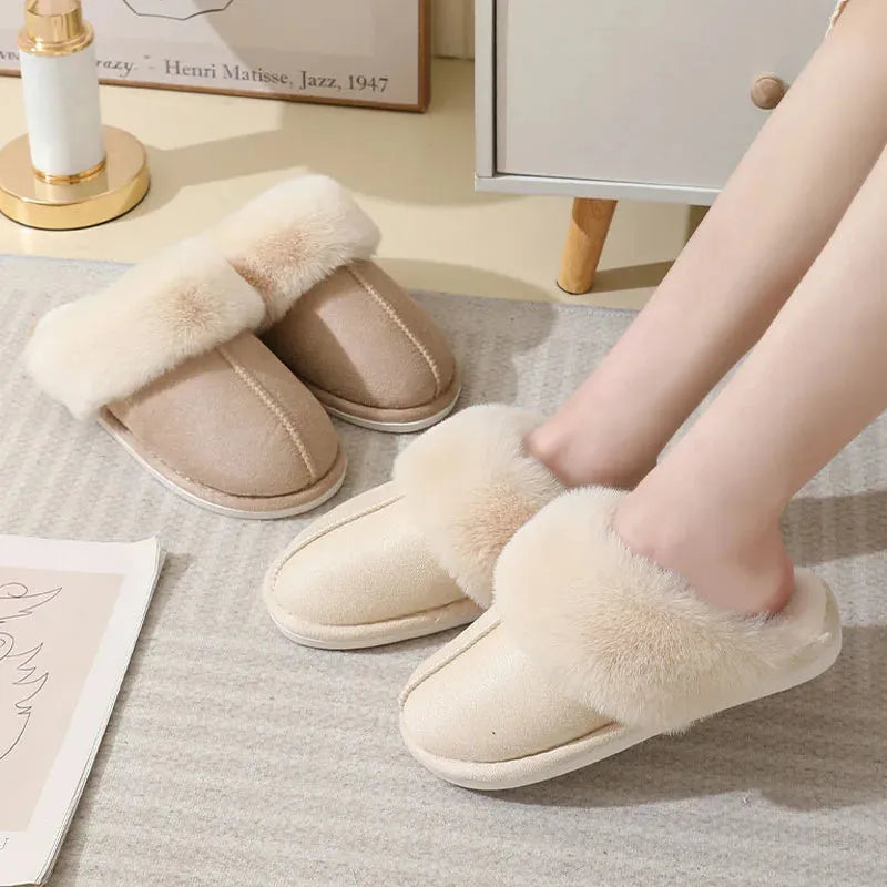 Women's brown plush indoor slippers with artificial wool lining and a textured PVC sole.