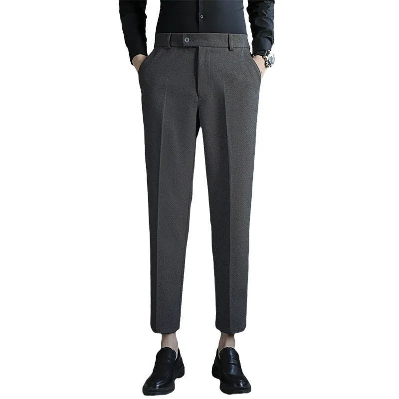 Men's straight fit brown corduroy trousers with elastic waistband on hanger