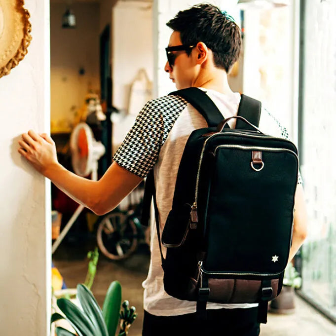 Men's modern Korean Oxford cloth backpack in army green colour, showing large capacity design.