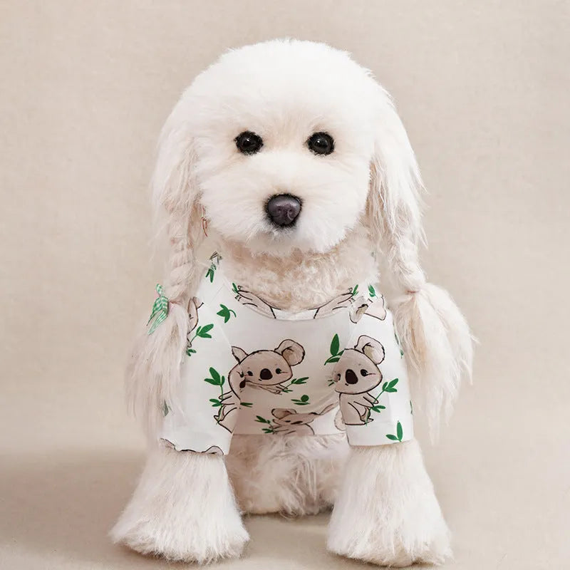 Printed polyester t-shirt for a small dog on a white background, showing colour and design.