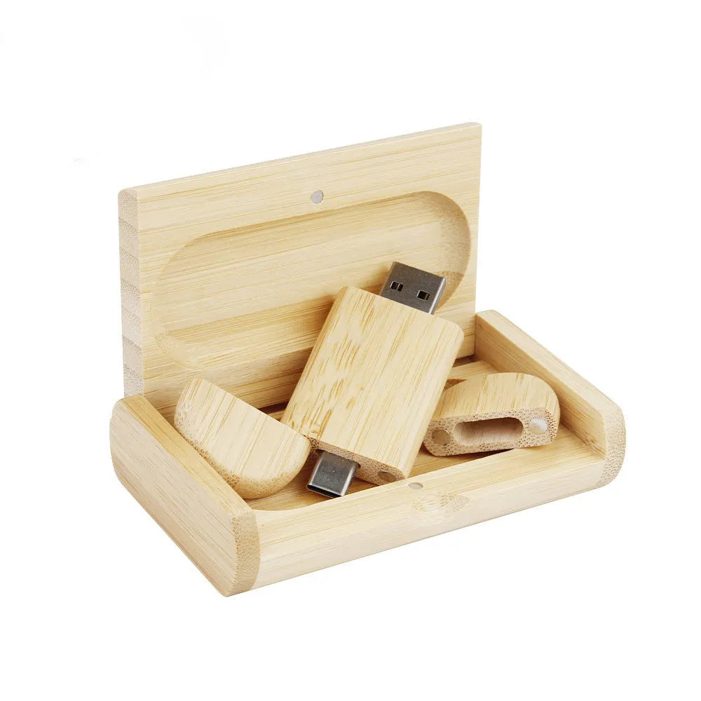 Maple wood carved USB flash drive with Type-C phone connector showing custom engraving