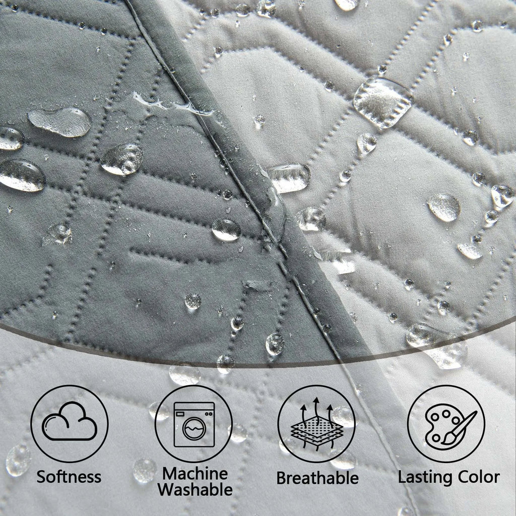 Reversible dark grey and light grey waterproof dog sofa cushion on a leather sofa