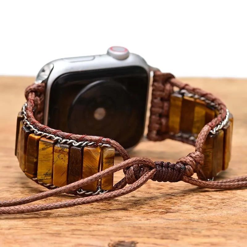 Rectangular tiger eye stone chain on a brown adjustable textile watch strap for men.