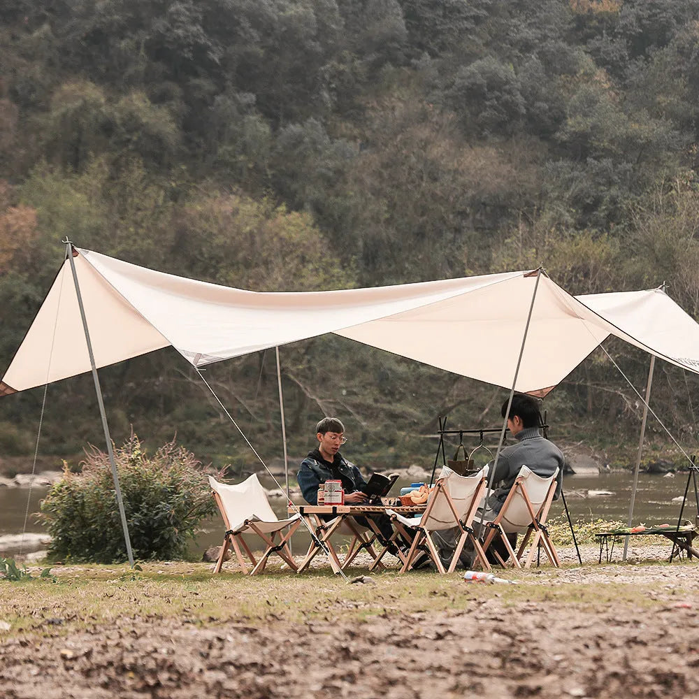 Silver aluminium foldable triangle camping clothes drying rack with side hanger and multiple hooks.