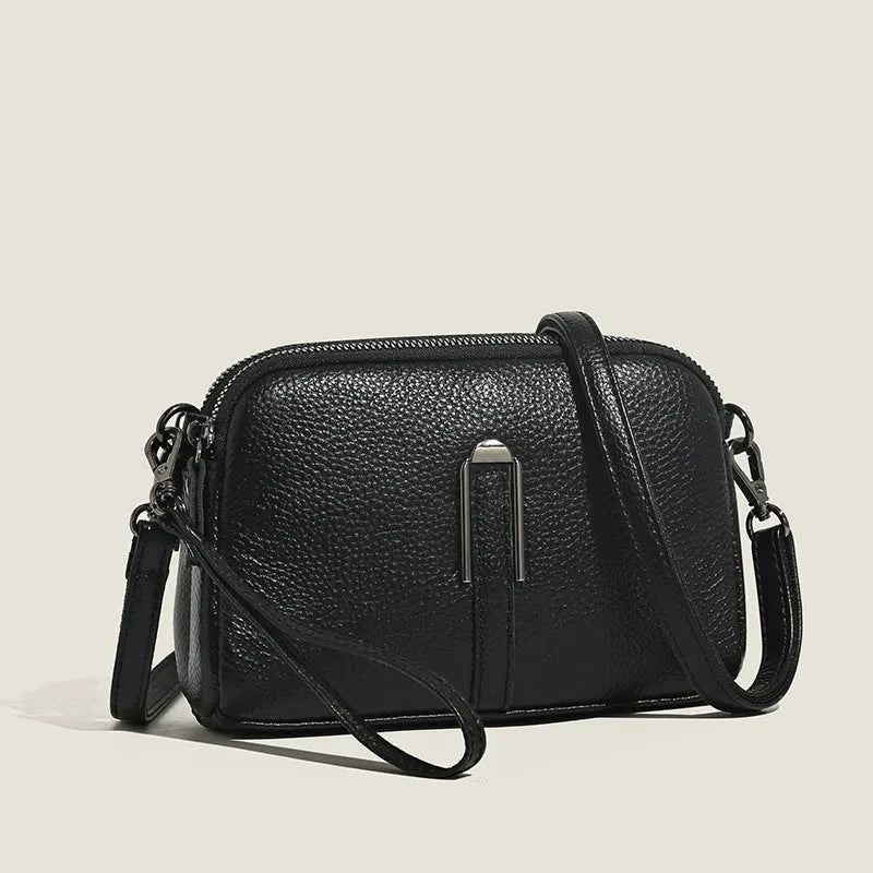 Women's genuine leather square shoulder bag in dark khaki colour, showing structured horizontal shape.