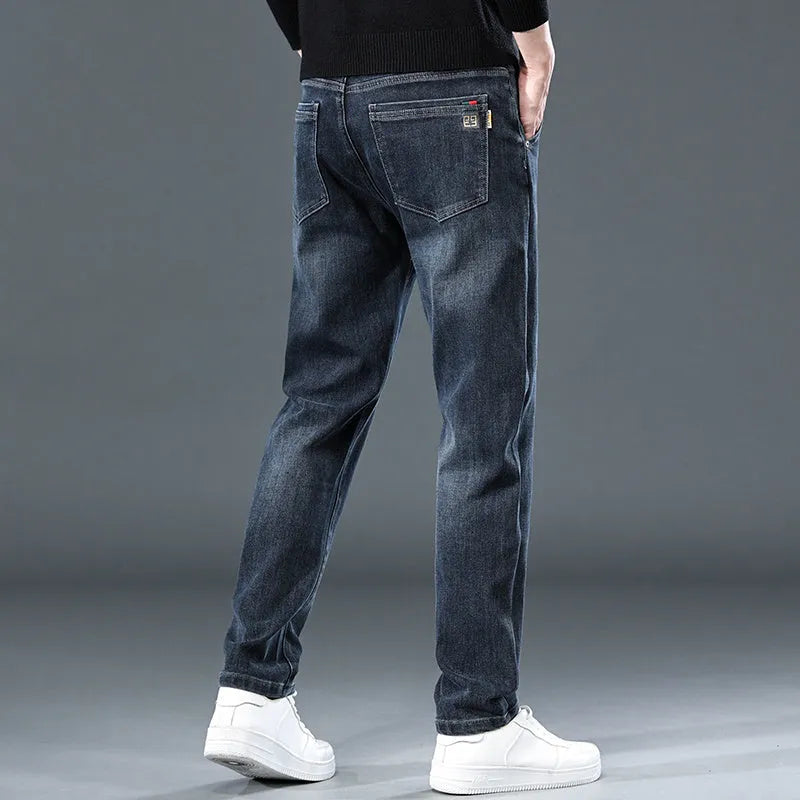 Slim straight casual trousers in black with micro elastic polyester fabric and zipper fly
