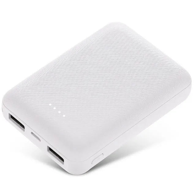 Black and white ultra-thin 10,000mAh power bank showing compact 90x63x22mm dimensions