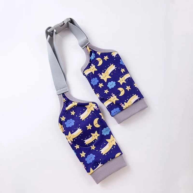 Dog wearing blue knee protector with elbow padding and matching scarf on front leg