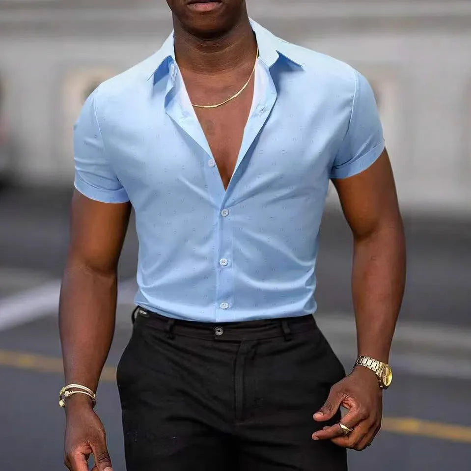 Light blue men's short-sleeved shirt with floral print, featuring a cardigan style and short sleeves.