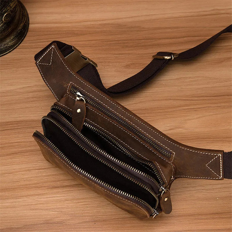 Brown cowhide leather men's sports waist bag with mobile phone compartment showing pull closure