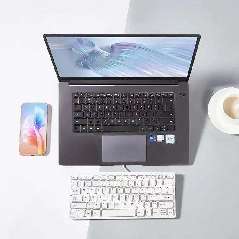 Compact USB wired keyboard in black, white, pink or blue colour with 1.3 metre cable