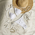 Women's halter lace-up bikini set in polyester, available in Milky White, Green, and White, sizes S to XL