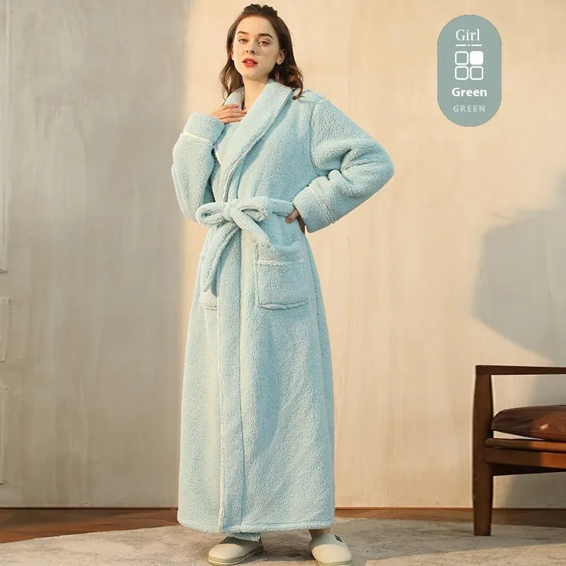 A man and woman wearing matching thickened flannel couple's bathrobes in a winter colour.