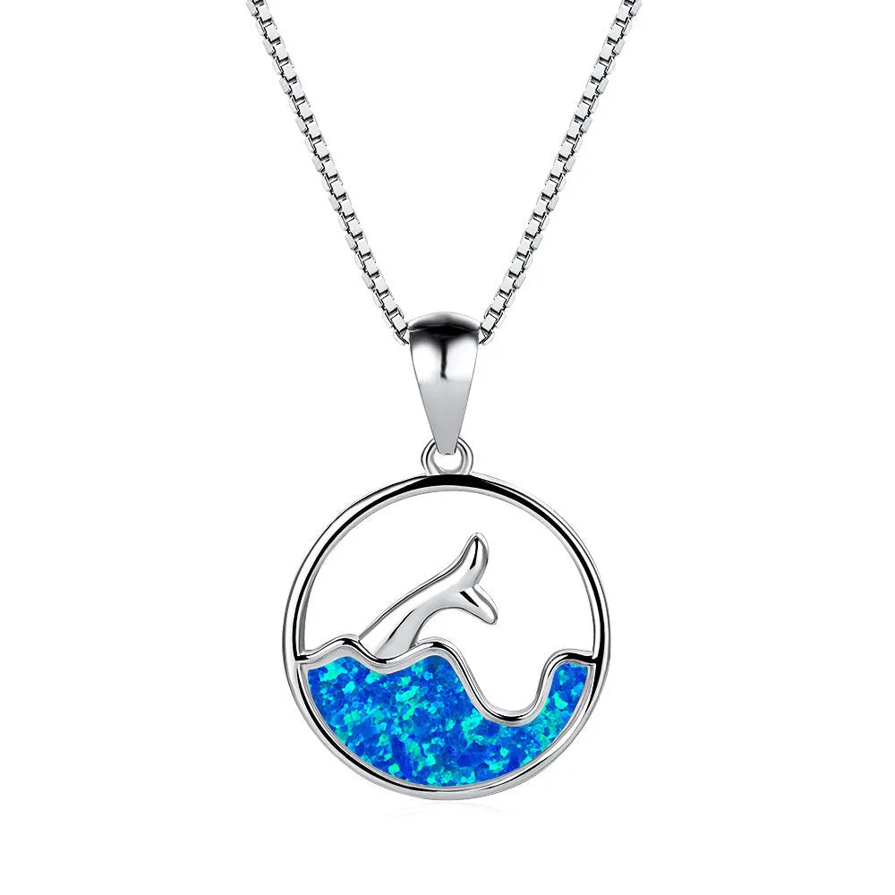Electroplated copper fishtail necklace with round opal elements in platinum blue finish